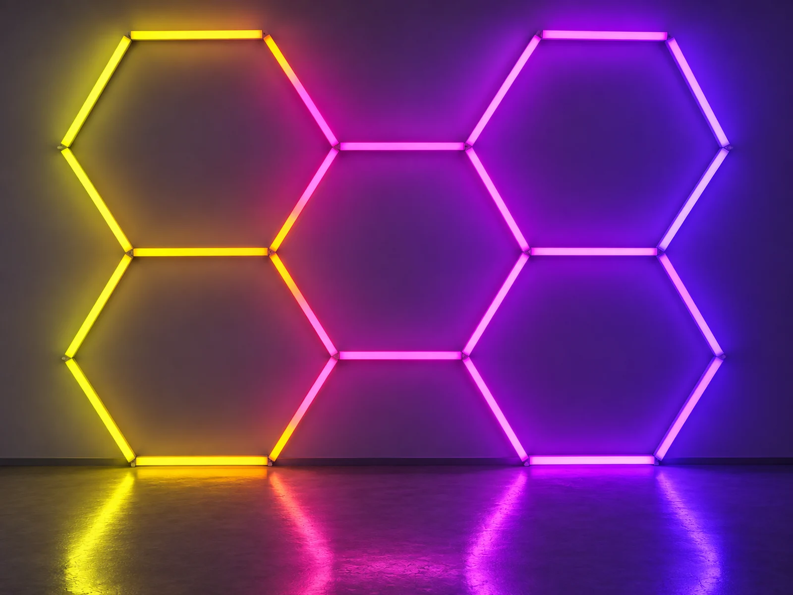 Four-cell RGB hexagon wall lighting in yellow and purple