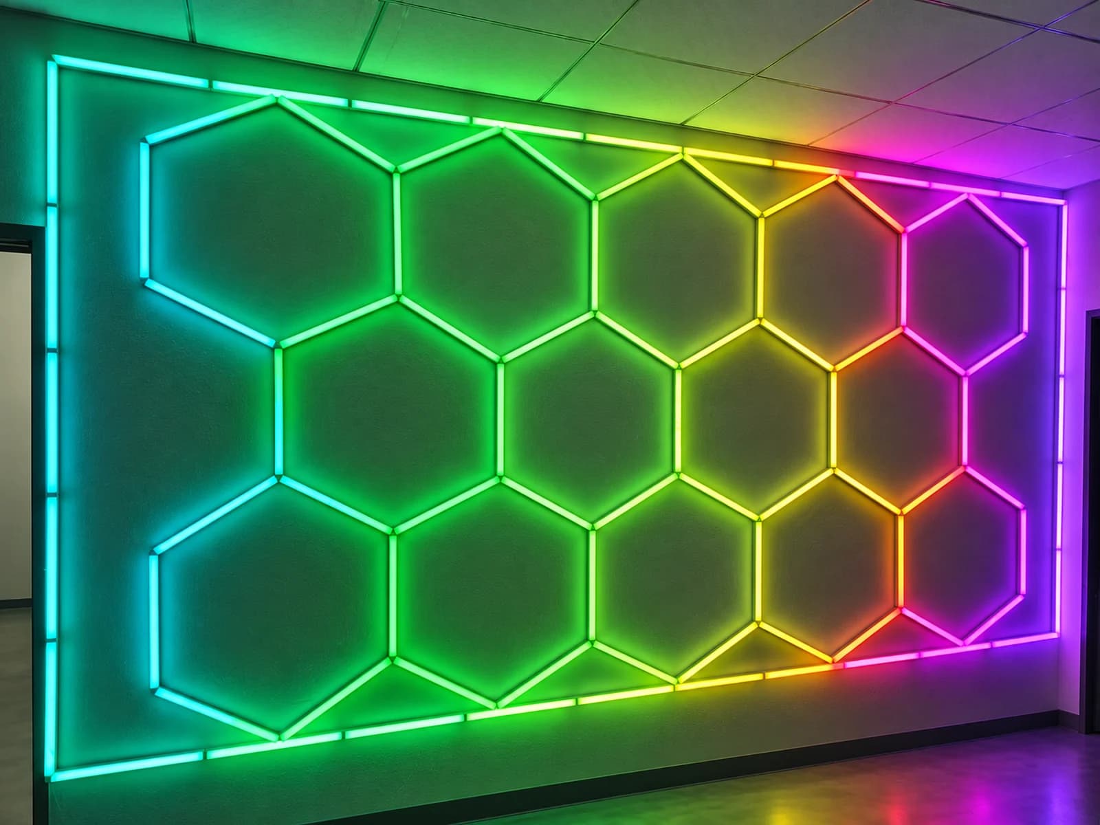 RGB honeycomb wall lighting in green, yellow and pink
